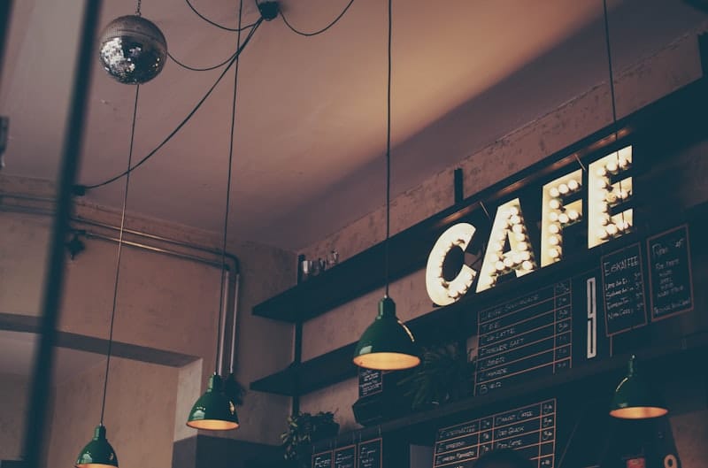 Minimalist Korean coffee shop with espresso drinks on counter