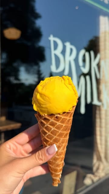 Waffle cone scoop in front of the Brokn Milk storefront window at 151 Barton — from venue Instagram @brokn_milk