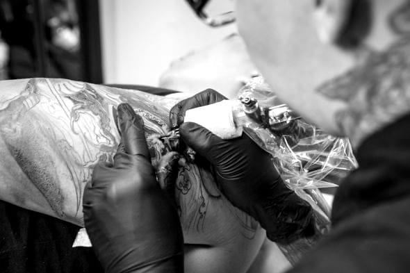 Lewis Family Tattoo Company, photographed for the official Wix site