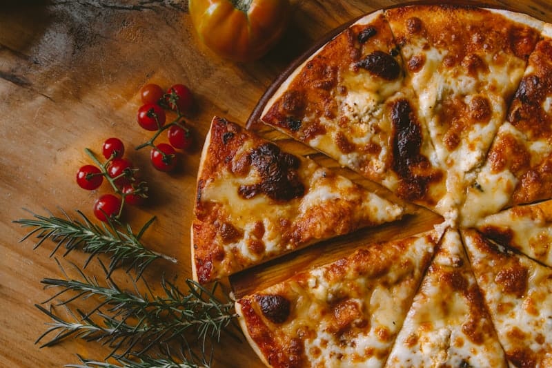 Casual pizza-by-the-slice counter with fresh pies