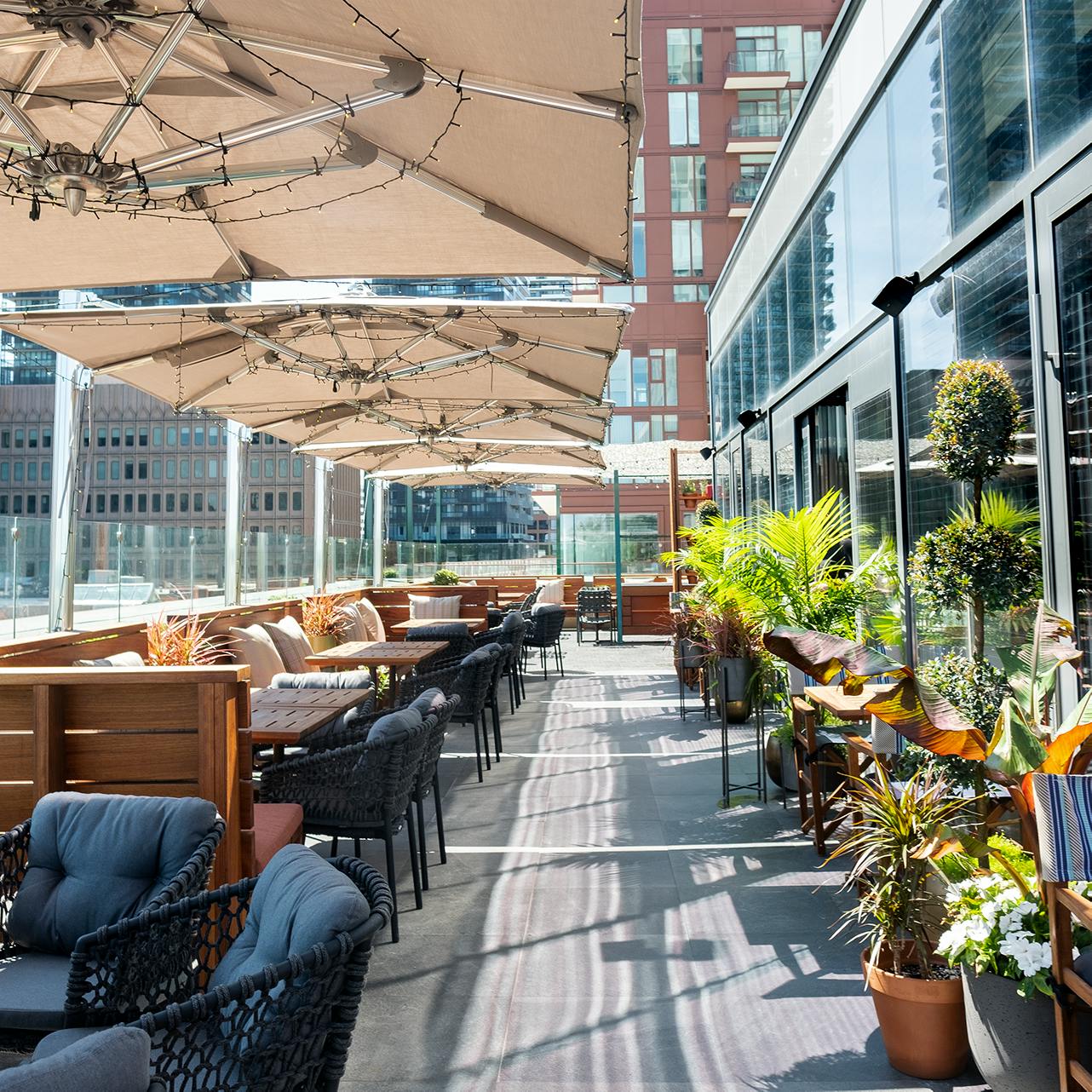 Stock Bar’s rooftop garden patio overlooking Midtown Toronto