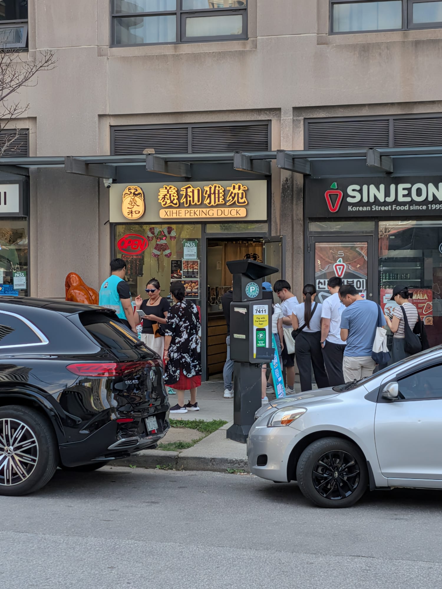 A lunchtime lineup outside Xihe Peking Duck at 7 Byng Avenue near Yonge and Finch