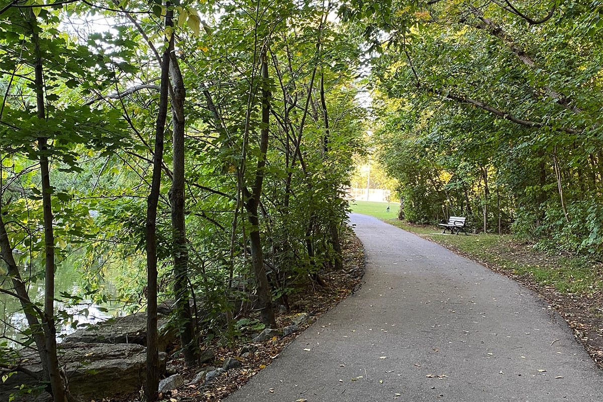 Trail running beside Etobicoke Creek in Etobicoke Valley Park